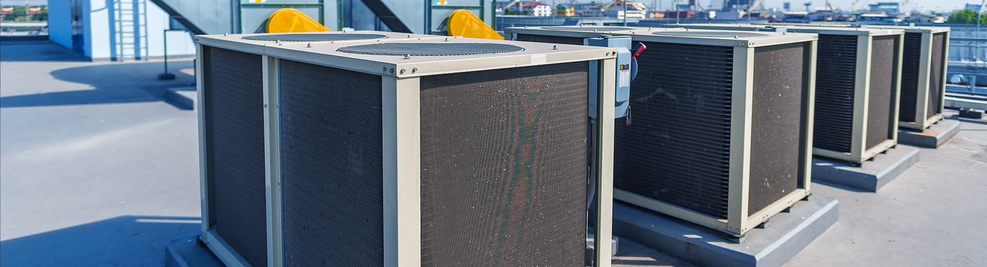 close up of several commercial air conditioners installed on top of a building fort lauderdale fl